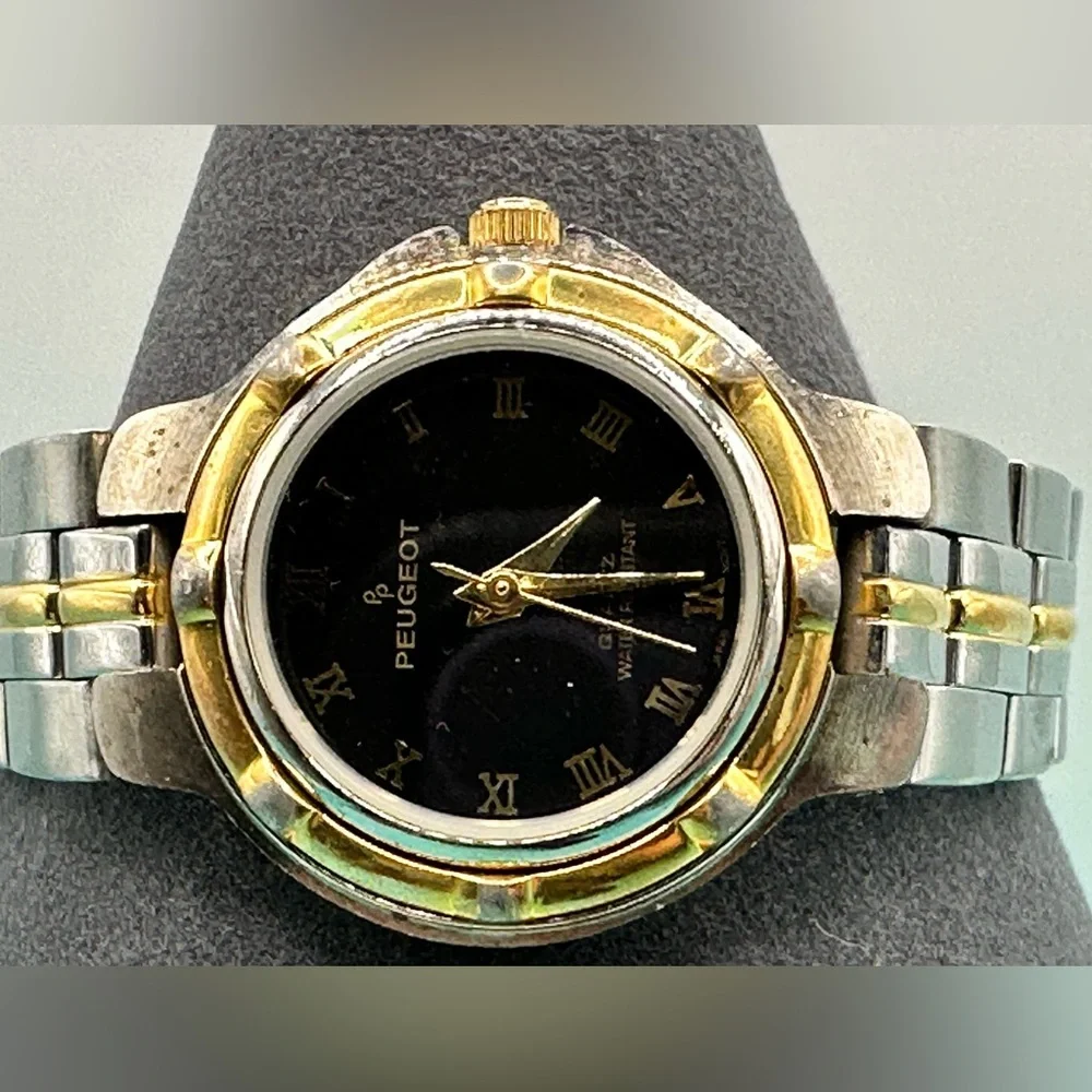 EUC Peugeot Black and Silver Watch